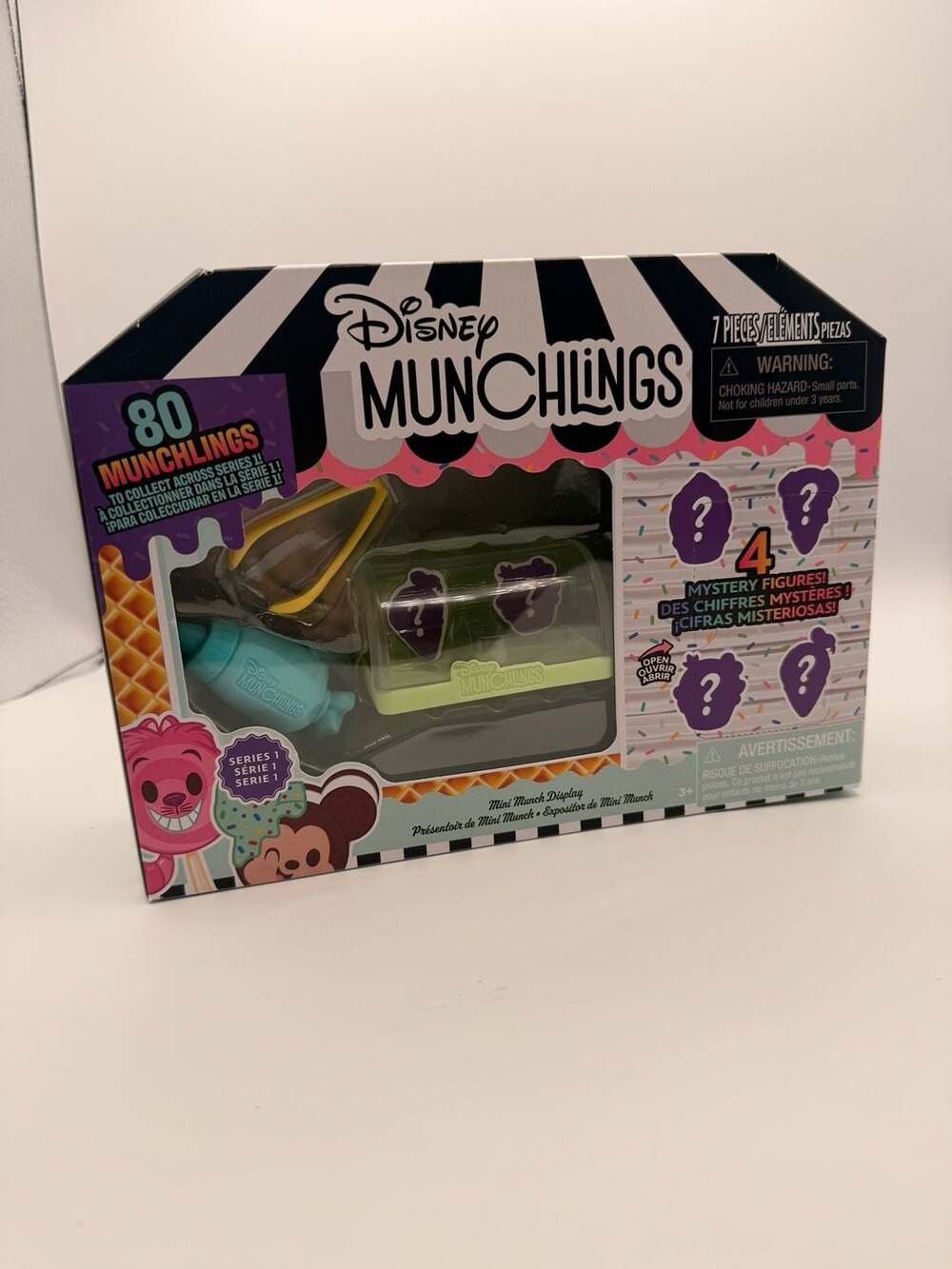Disney Munchlings 
Mini Munch Display Case with 4 Mystery Figures